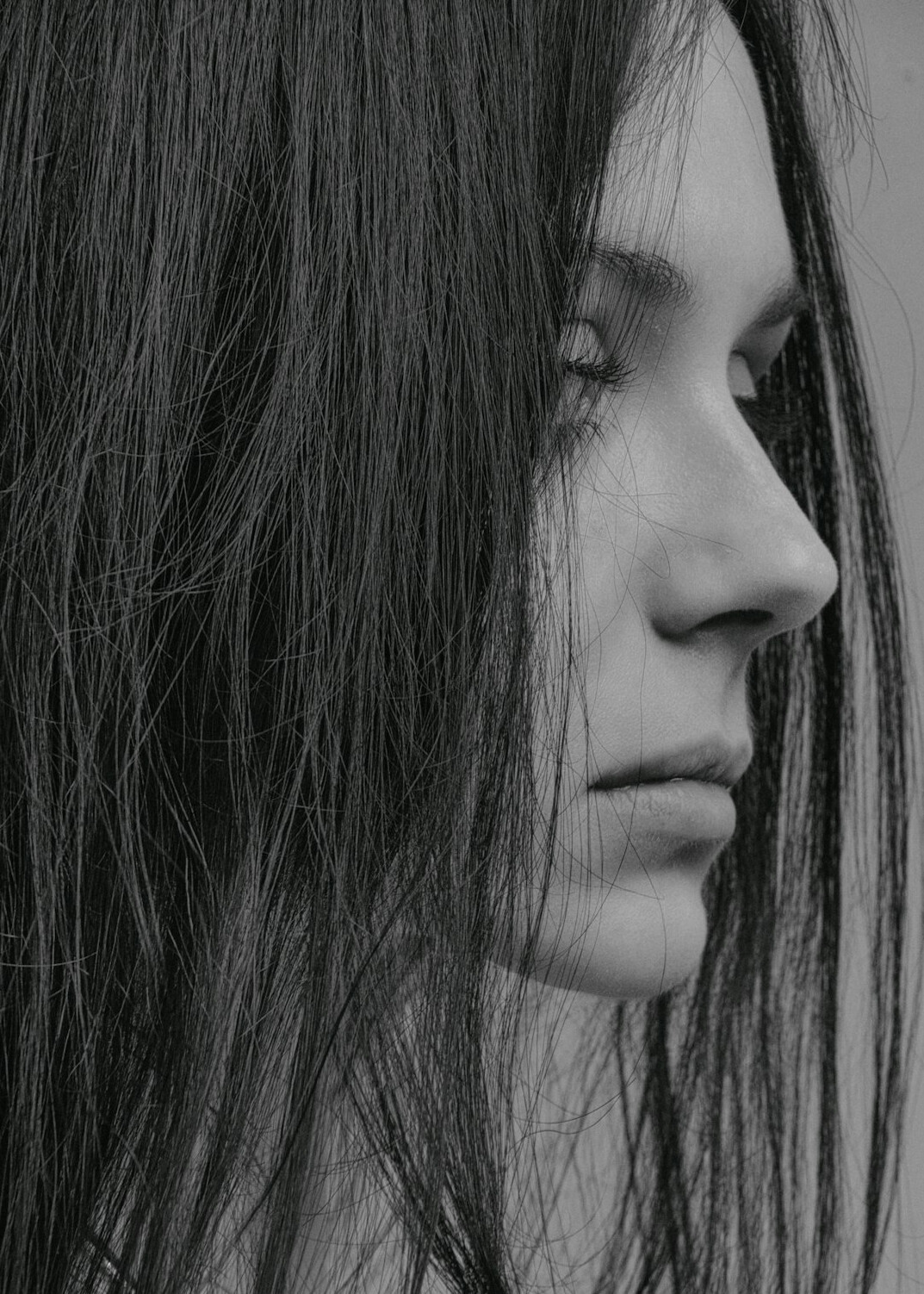 Portrait of a woman with long dark hair